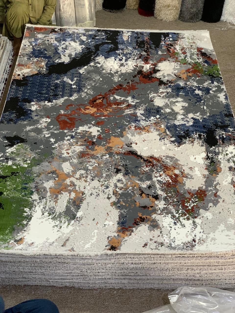 Modern Abstract Area Rug, featuring a vibrant, multi-colored abstract design