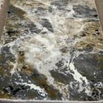 Modern Abstract Area Rug with a mottled or textured appearance