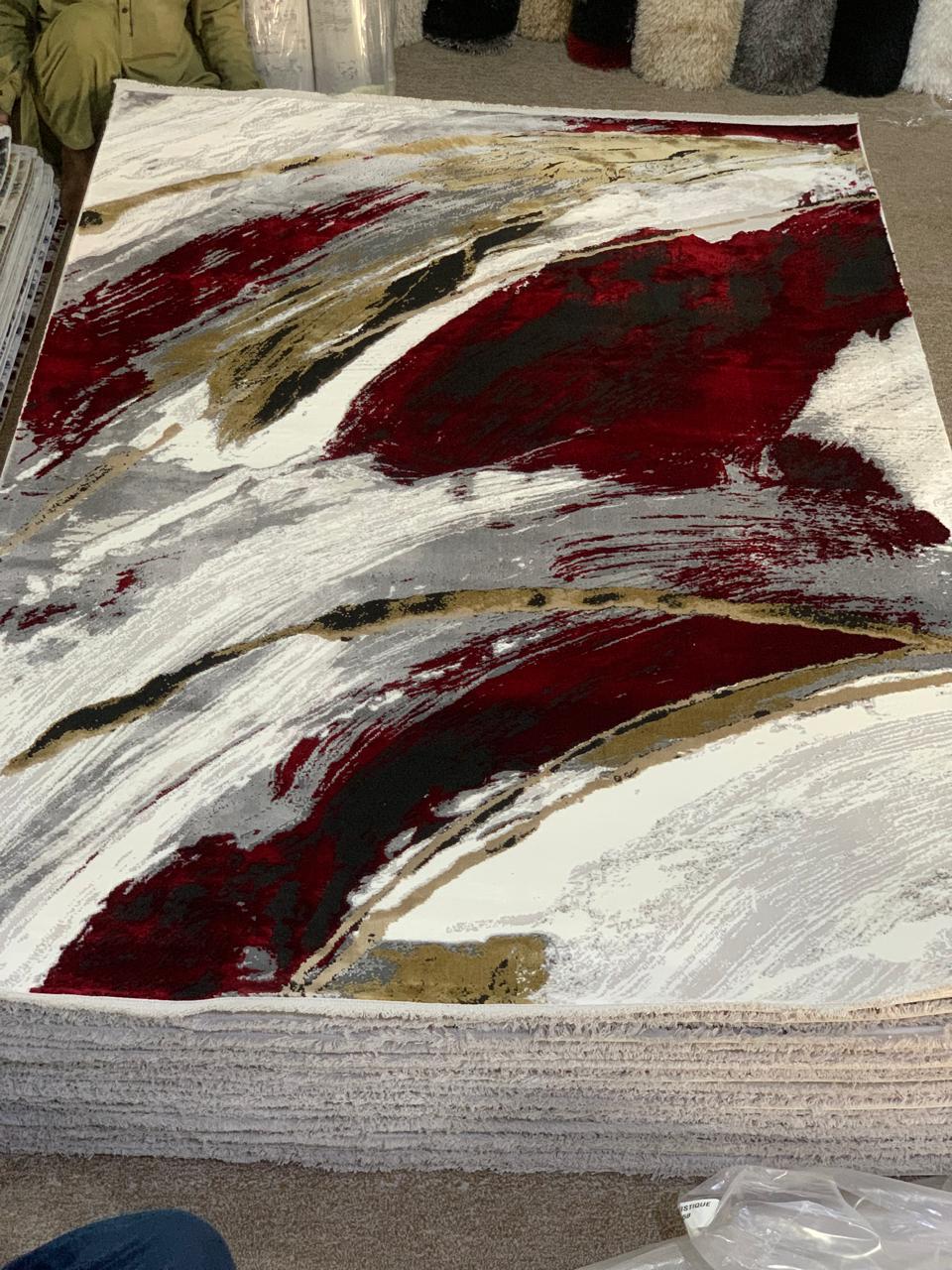 Modern abstract brushstroke design with vibrant red